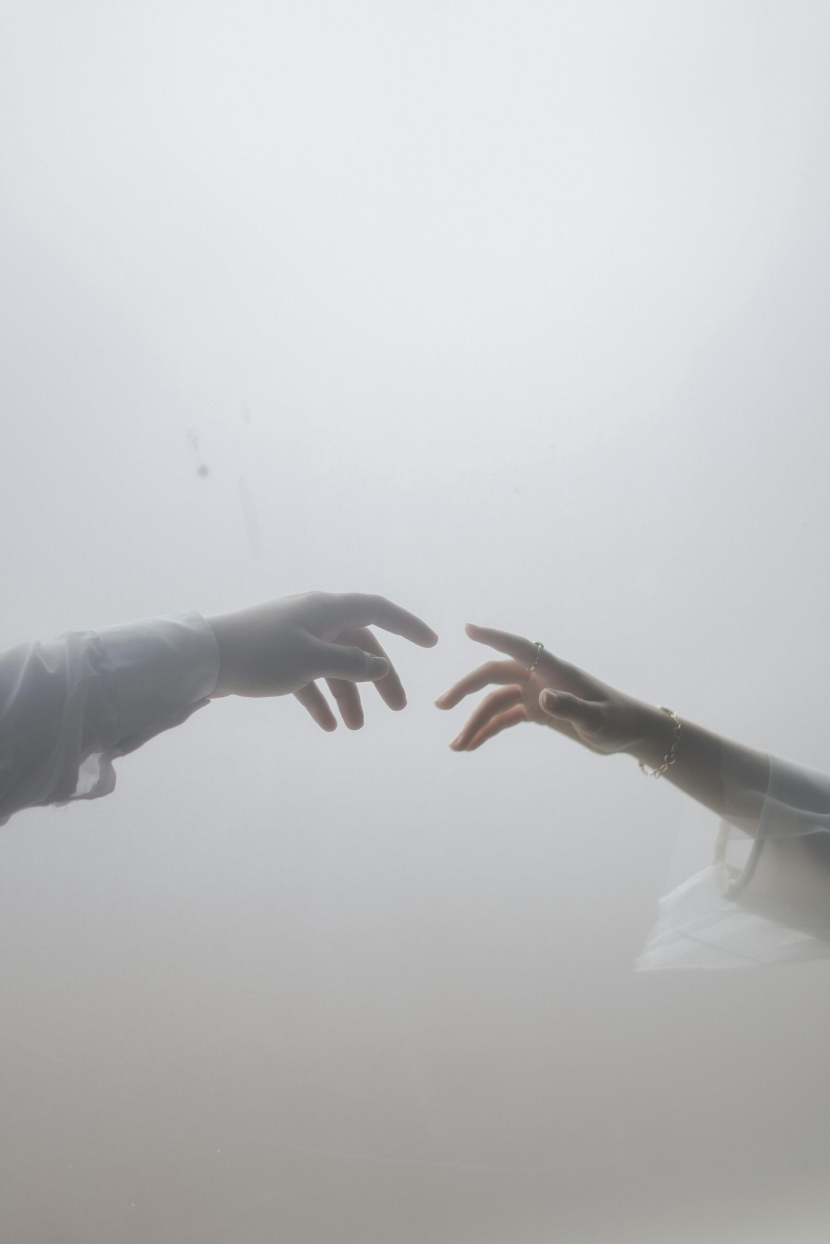 two people touching finger relationship coaching
